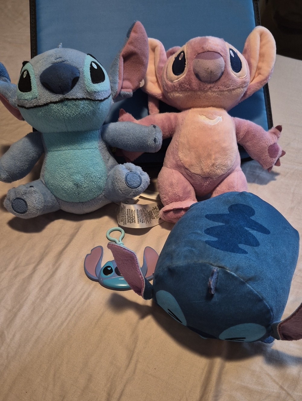 Blue and Pink Stitch-Inspired Plush Duo with Navy Accessory